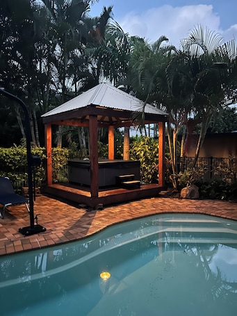Pool. Synergy Beachside Nudist Retreat 2 minute walk to beach A/C King bed breakfast