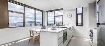 Capital Views Apartment with Parking