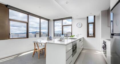 Capital Views Apartment with Parking