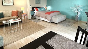 Una sala de estar moderna con un sofá, una mesa de centro y una lámpara decorativa grande.