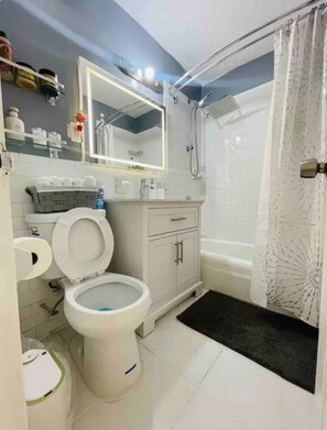 Hair dryer, towels, soap, shampoo