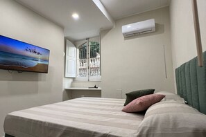 2 quartos, ferros/tábuas de passar roupa, Wi-Fi, roupa de cama