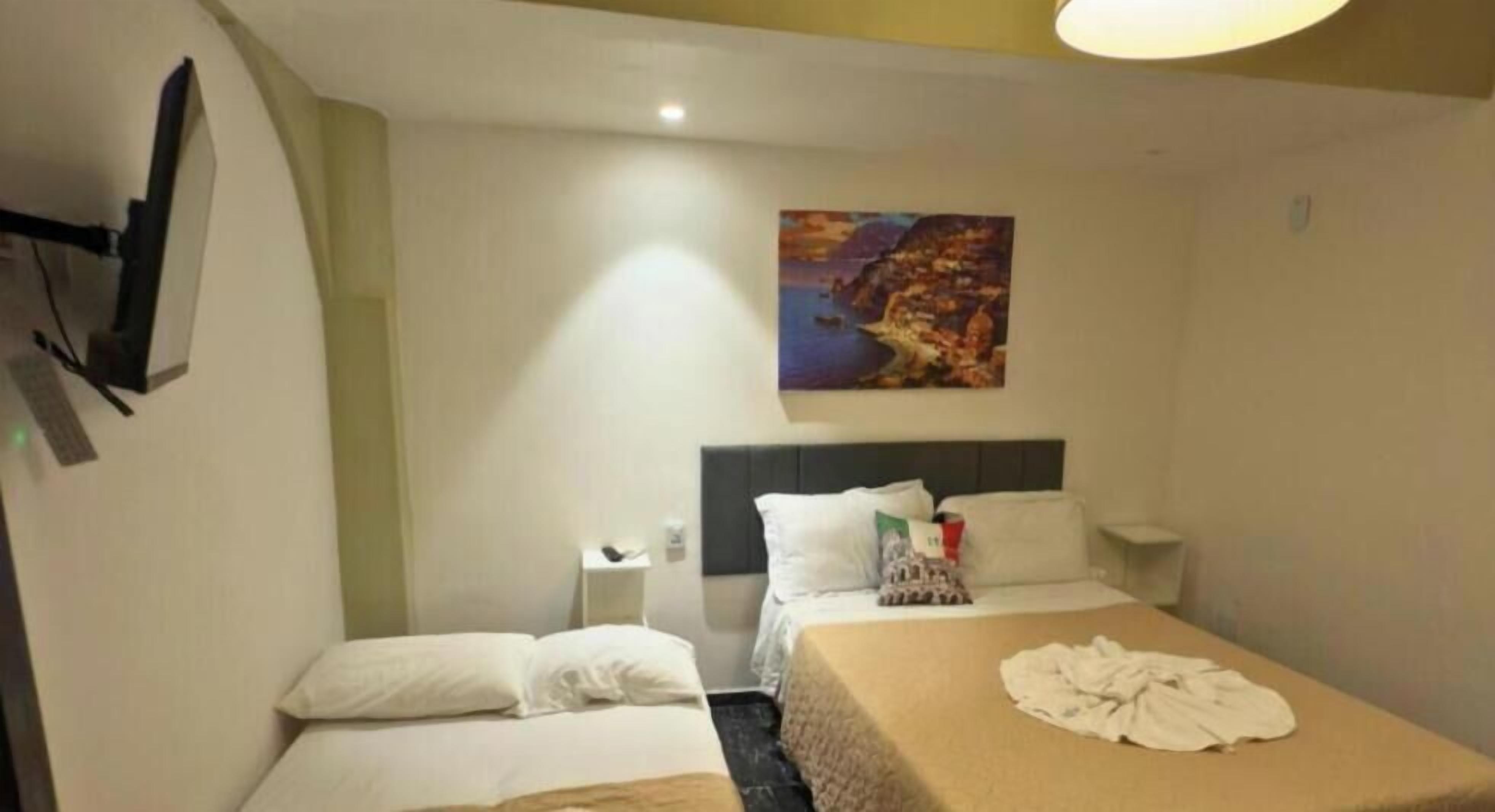Habitación ejecutiva con 2 camas individuales | Caja de seguridad en la habitación, cortinas blackout y ropa de cama 