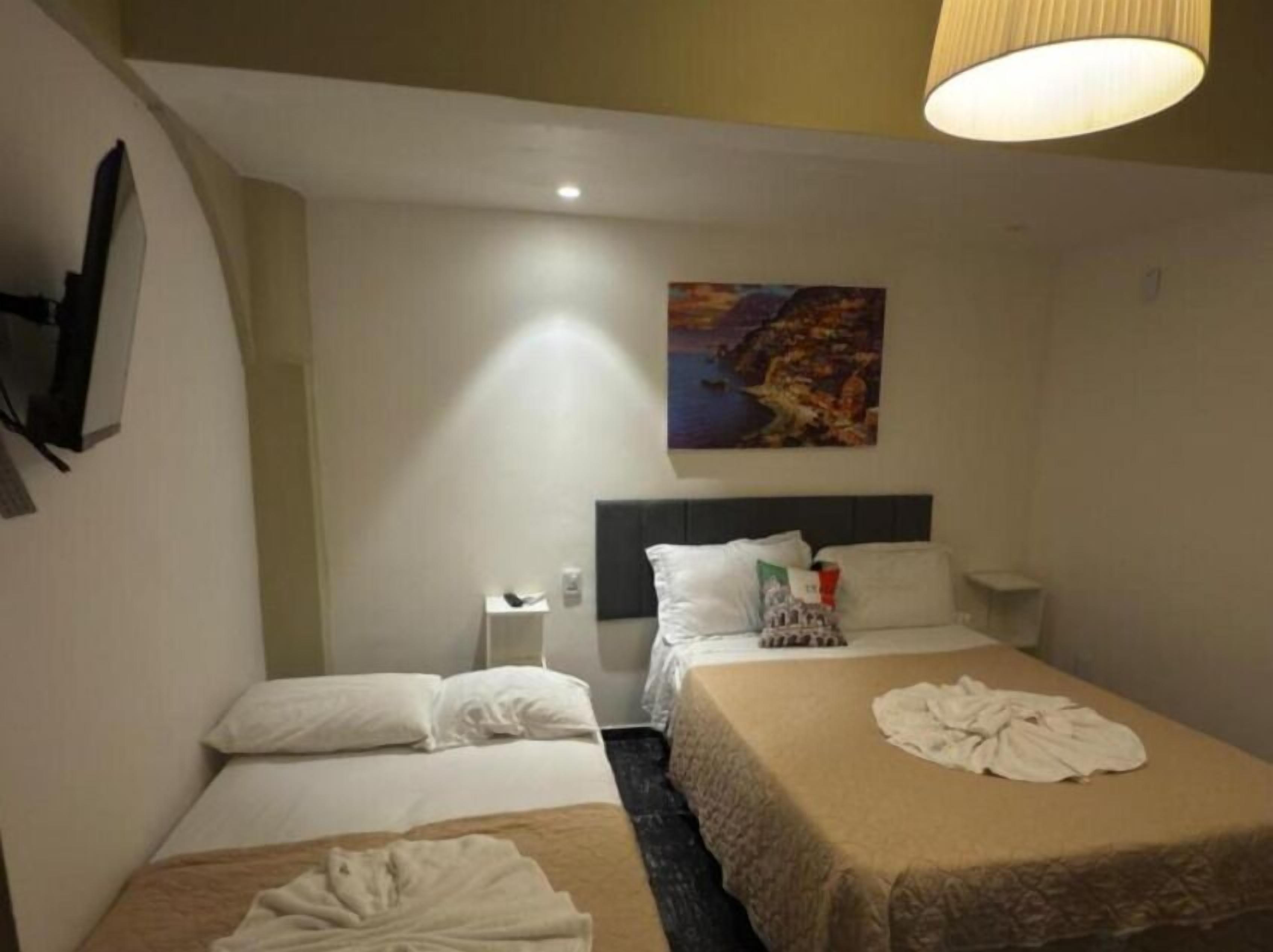 Habitación ejecutiva con 2 camas individuales | Caja fuerte, cortinas opacas, ropa de cama