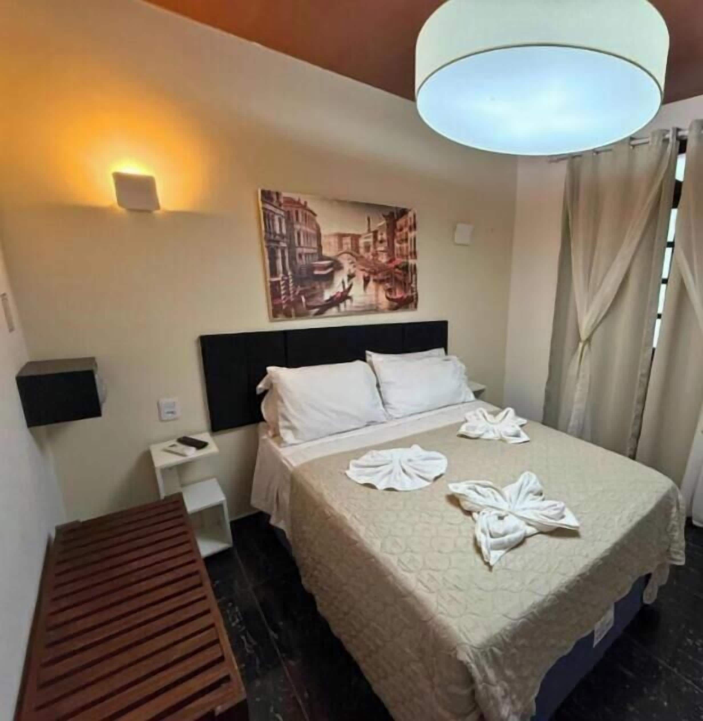 Habitación doble ejecutiva | Caja de seguridad en la habitación, cortinas blackout y ropa de cama 