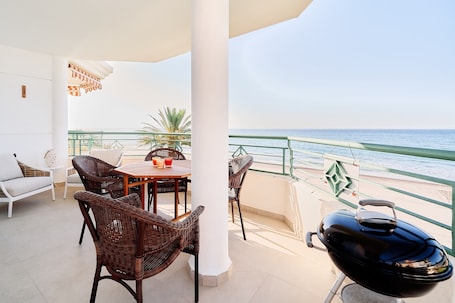 Outdoor dining. Apartment 'First Line Oasis Td05' with Sea View, Wi-Fi and Air Conditioning
