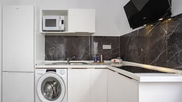 Fridge, microwave, stovetop, coffee/tea maker