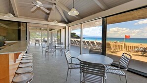 A modern bar area with a view of the beach. - West Maui 1BR condo with lanai, pool, AC, beach access & resort views.- EL E204 (Lahaina)