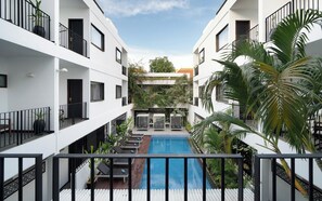 Junior King Suite Pool View with Balcony, Sofa, and Bathtub | Balcony view - The Calm Oasis (Siem Reap)