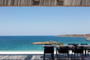 Outdoor dining - Coastal Villa Defined by Detail & Sleek Simplicity by etouri (Chania)