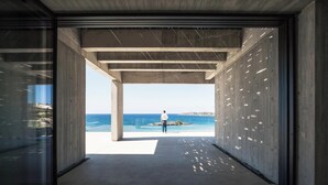 A modern interior with a view of the sea. - Coastal Villa Defined by Detail & Sleek Simplicity by etouri (Chania)