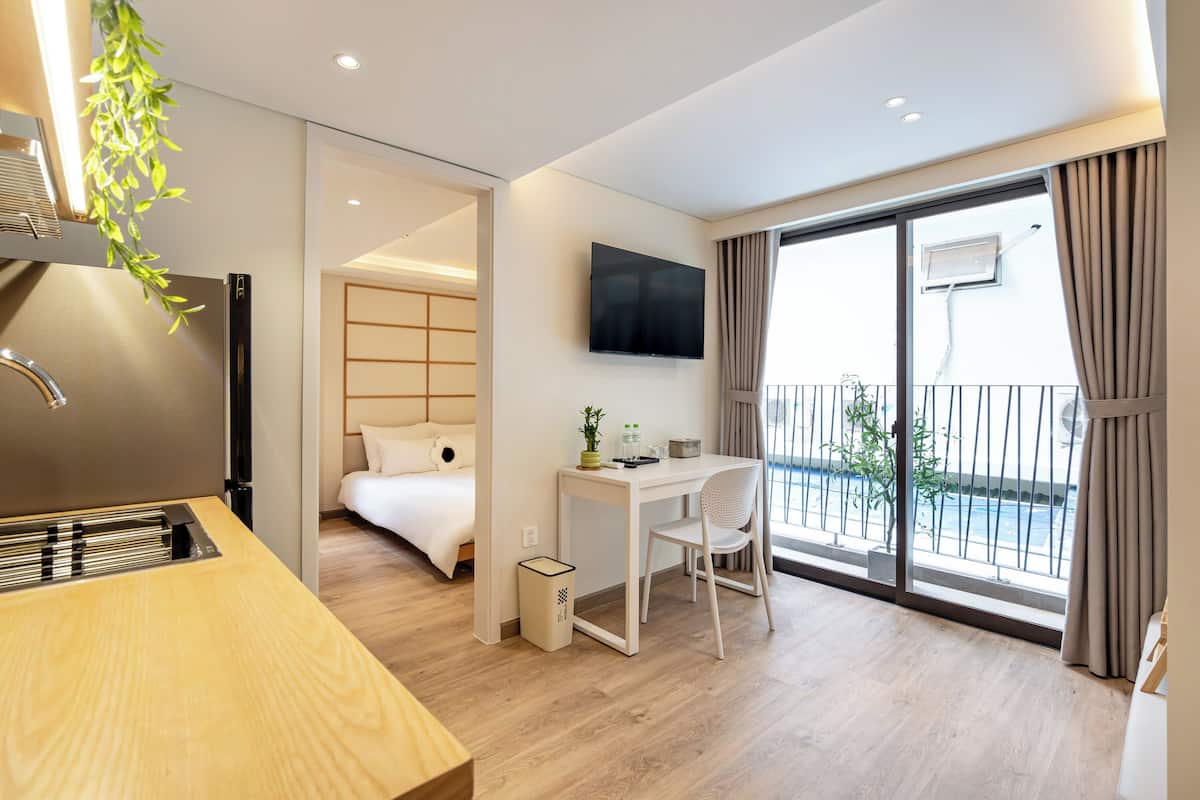 Tatami Junior One-bedroom Suite Balcony - Garden View | 1 camera, Wi-Fi gratuito, lenzuola