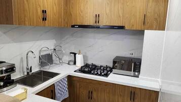 Comfort Room, City View | Private kitchen | Coffee/tea maker