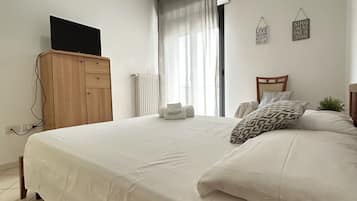 1 habitación, tabla de planchar con plancha, wifi y ropa de cama