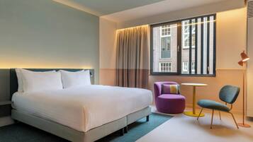 Deluxe Room, 1 King Bed | Minibar, in-room safe, laptop workspace, blackout drapes
