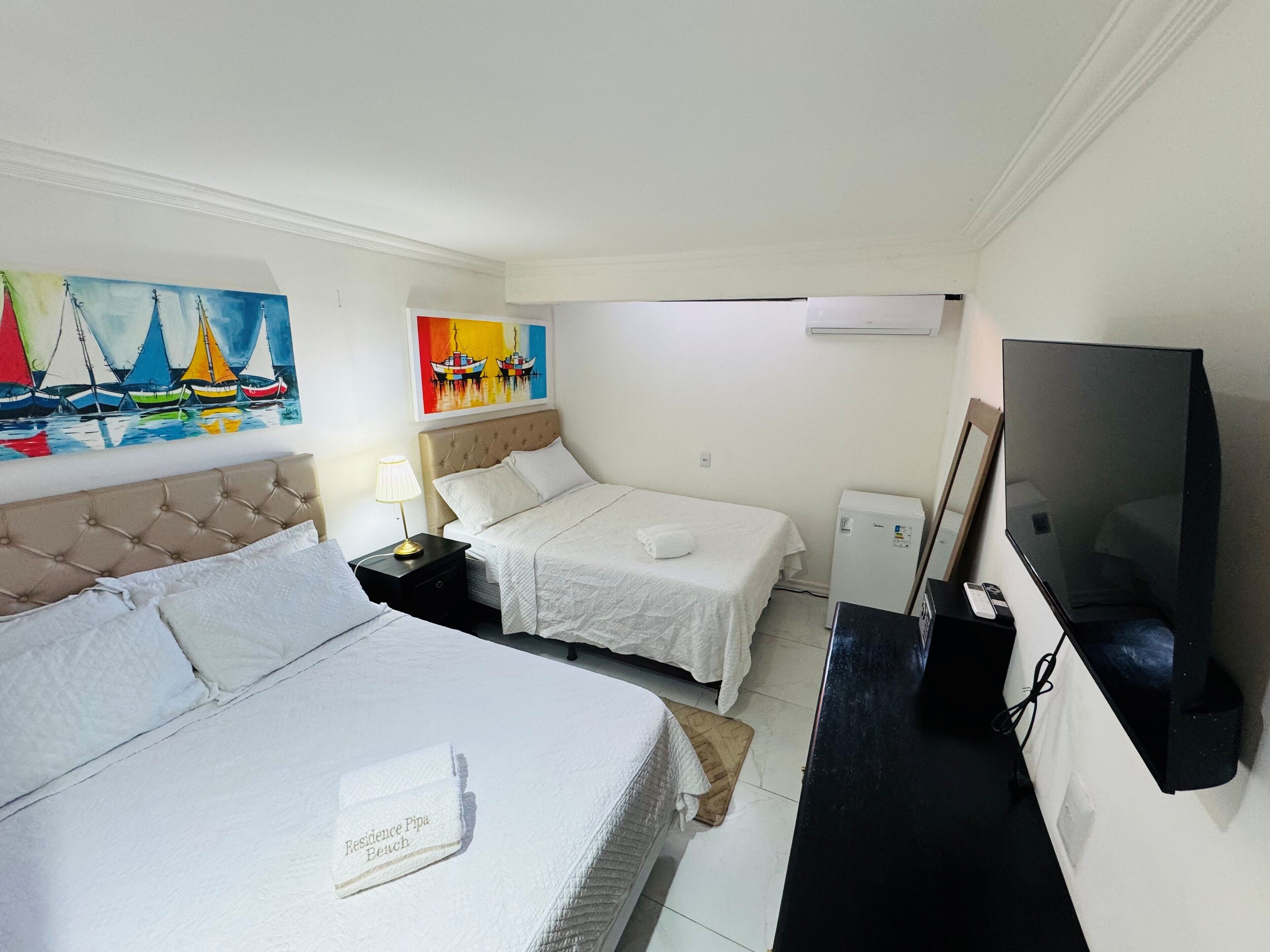 Deluxe Quadruple Room, Courtyard View | Premium bedding, minibar, in-room safe, individually decorated