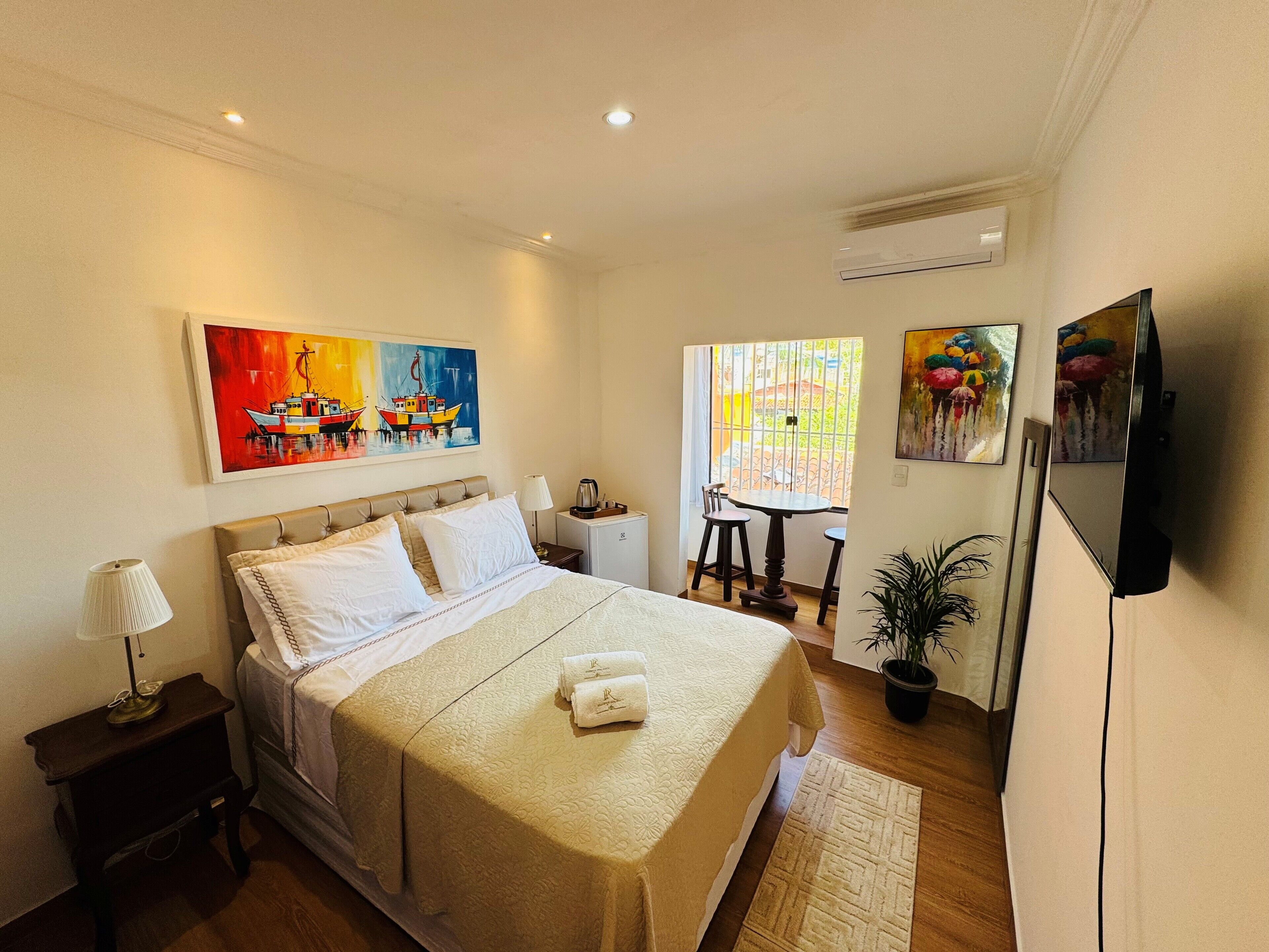 Deluxe Double Room, Ocean View | Premium bedding, minibar, in-room safe, individually decorated