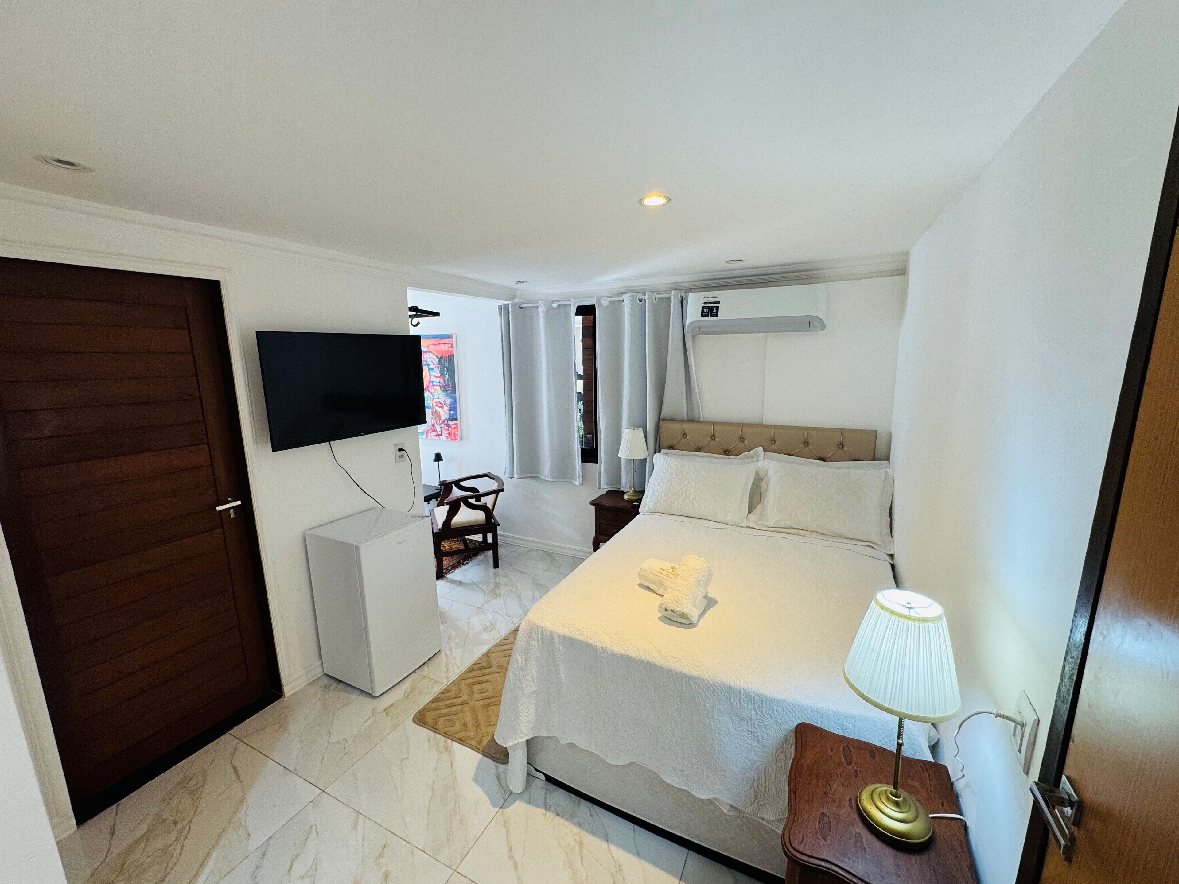 Deluxe Apartment, Courtyard View | Premium bedding, minibar, in-room safe, individually decorated
