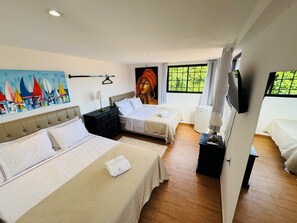 Panoramic Quadruple Room, Ocean View | Premium bedding, minibar, in-room safe, individually decorated - Residence Pipa Beach (Tibau do Sul)