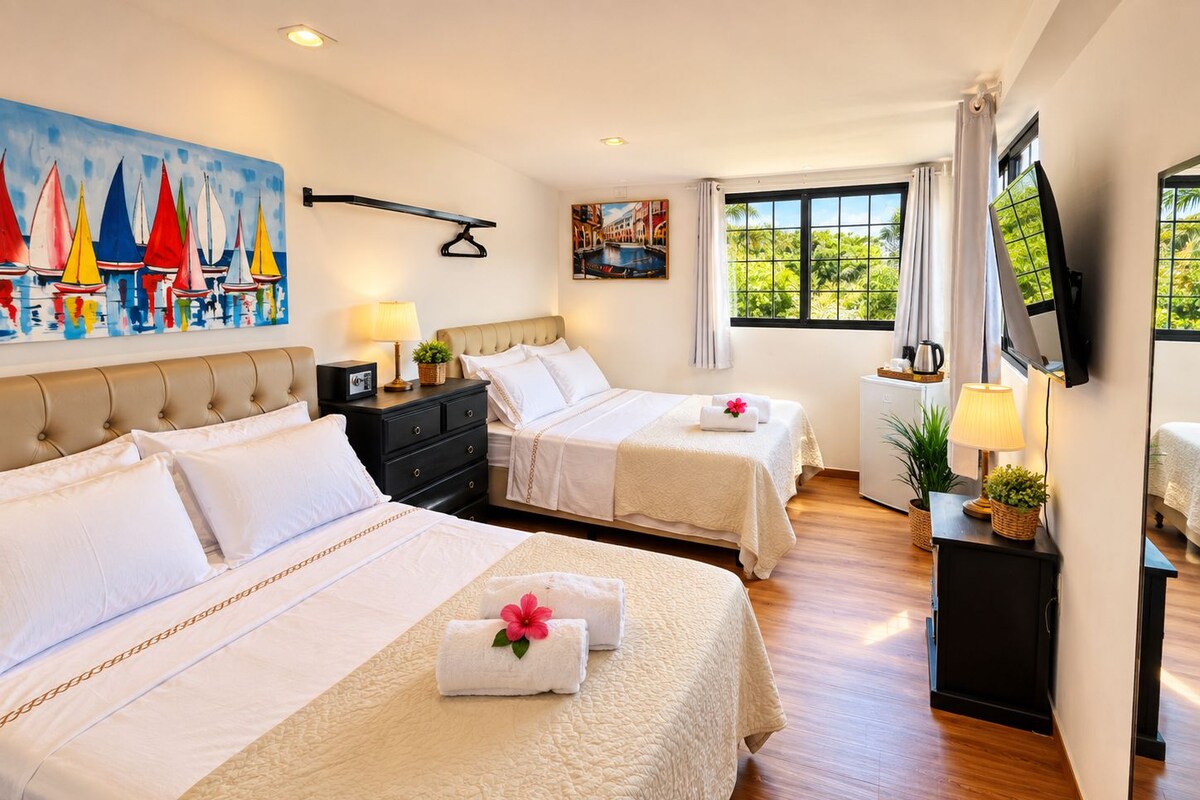 Panoramic Quadruple Room, Ocean View | Premium bedding, minibar, in-room safe, free WiFi