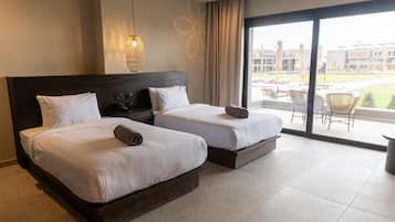 Minibar, caja de seguridad en la habitación y cortinas blackout