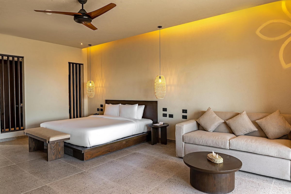 Junior Suite, 1 Bedroom, Sea View | 1 bedroom, minibar, in-room safe, blackout drapes