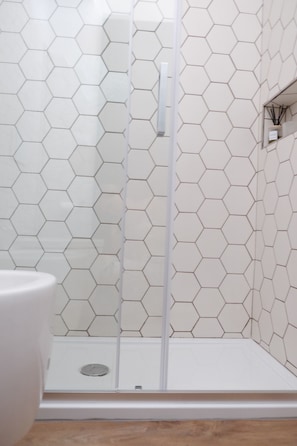 Shower, eco-friendly toiletries, hair dryer, bidet