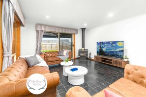 TV, offices - Coastal Comfort 4BR Vacation Home in Hallett Cove (Hallett Cove)