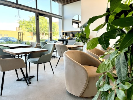 Daily cooked-to-order breakfast for a fee. HQ Arena Hotel