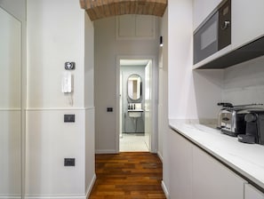 Fridge, electric kettle, toaster, cookware/dishes/utensils