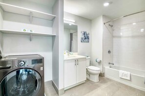 Shower, hair dryer, towels