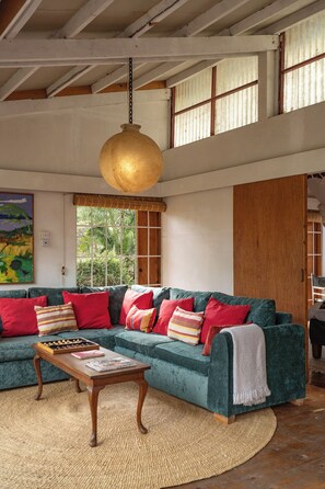 Fireplace - A unique, eco-friendly hideaway with walls that open to the savannah, allowing safari wildlife viewing from the comfort of the living room. (Naivasha)