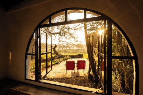 Charming 1-bedroom cottage on Lake Naivasha with private garden and wildlife views on the lake.