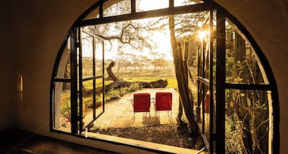 Charming 1-bedroom cottage on Lake Naivasha with private garden and wildlife views on the lake.