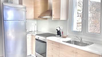 Suite monolocale Comfort | Cucina privata | Macchina per caffè espresso, carta assorbente