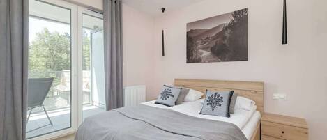 1 slaapkamer, een strijkplank/strijkijzer, wifi, beddengoed