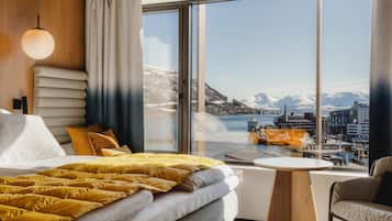 Quarto superior, 1 cama King (Plus) | Cofres nos quartos, quartos à prova de som, Wi-Fi de cortesia