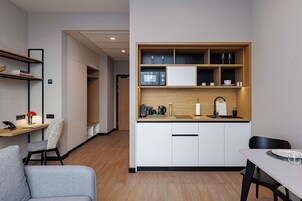 Apartment, Multiple Beds, Kitchenette, City View (45SQM) | In-room safe, desk, laptop workspace, blackout drapes