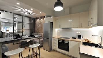 Luxury Apartment | Living area | 32-inch LED TV with digital channels