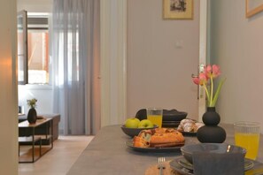 Comfort Apartment | Private kitchen | Full-size fridge, oven, coffee/tea maker, cookware/dishes/utensils