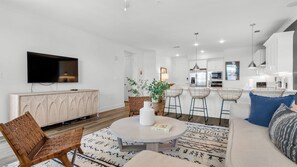 Apartment, Mehrere Betten, Whirlpool, Meerblick | Wohnbereich