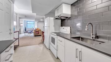 Townhome, 1 Bedroom | Private kitchen | Fridge, oven, coffee/tea maker, toaster