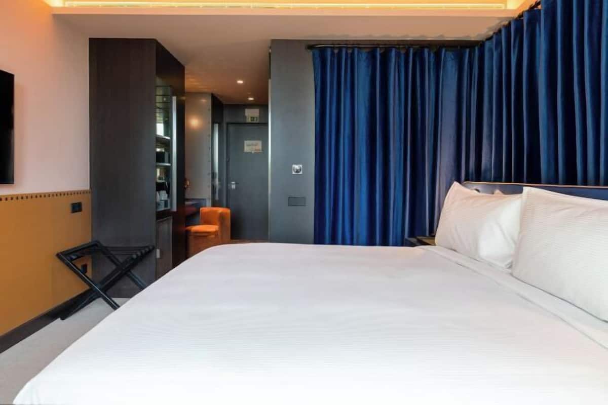 1 chambre, couette en duvet d'oie, minibar