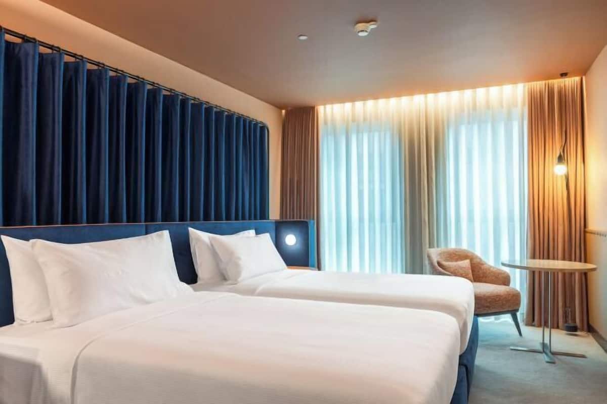 1 chambre, couette en duvet d'oie, minibar