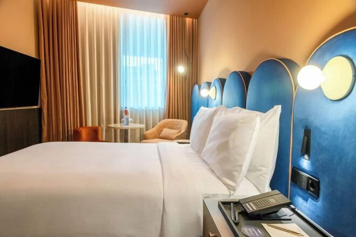 1 chambre, couette en duvet d'oie, minibar