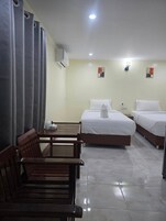 Standard Twin Room, Balcony, Garden View | Desk, free WiFi