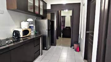 Family Villa, 4 Bedrooms | Private kitchen | Dining tables