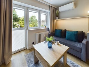 Studio, Balcony | Living area | 50-inch Smart TV with cable channels - Beautiful Studio With Balcony by Renters (Warsaw)