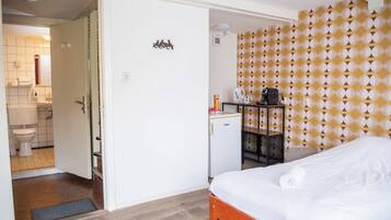 City Double Room | Bathroom | Shower, hair dryer, towels, soap