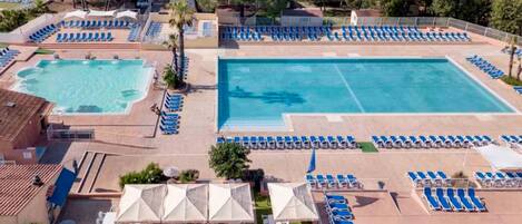 Relax by the large central pool surrounded by sun loungers and smaller pools.